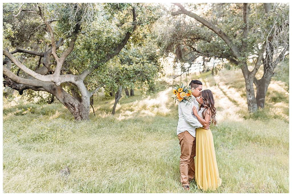 los angeles engagement places; engagement outfits; gorgeous engagement session; thousand oaks engagement, picnic engagement, in the woods, los angeles photographer, santa barbara photographer, couple in love, long yellow flowy dress, spring engagement photo session