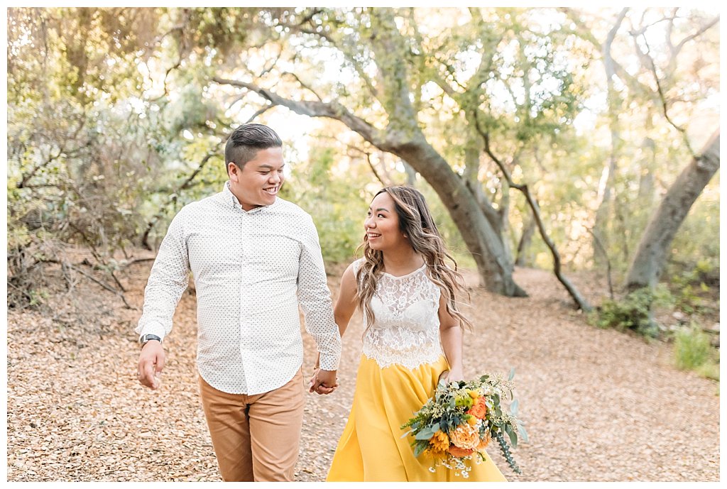 thousand oaks engagement, picnic engagement, in the woods, los angeles photographer, santa barbara photographer, couple in love, long yellow flowy dress, spring engagement photo session; couple walking