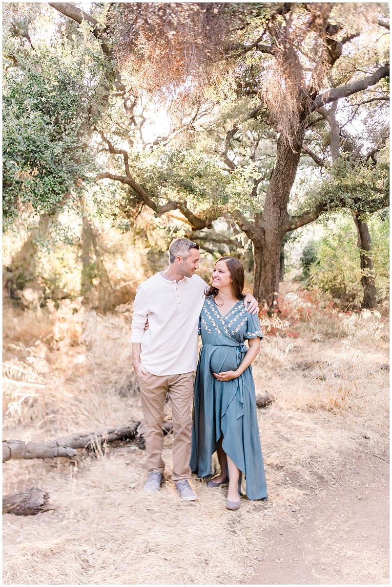 joyful maternity photo session,beautiful maternity photo session in the woods,light and airy maternity photo session,maternity session by oak trees,los angeles family photographer,agoura hills photographer,calabasas photographer,camarillo photographer,dasha dean photography,moorpark photographer,newbury park photographer,oak park photographer,ojai photographer,oxnard photographer,pasadena photographer,santa barbara photographer,simi valley photographer,southern california photographer,thousand oaks photographer,ventura photographer,ventura county photographer,westlake village photographer,malibu photographer,santa monica photographer,beverly hills photographer,